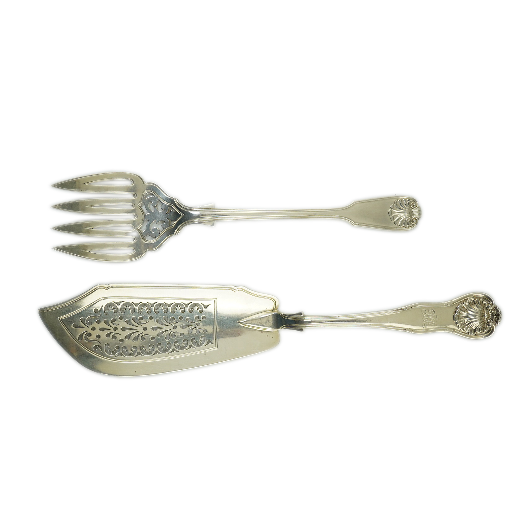 A Victorian silver fiddle, thread and shell pattern fish server and a similar shell pattern fish slice, John James Whiting, London, 1857 and William Eaton, London, 1836 respectively